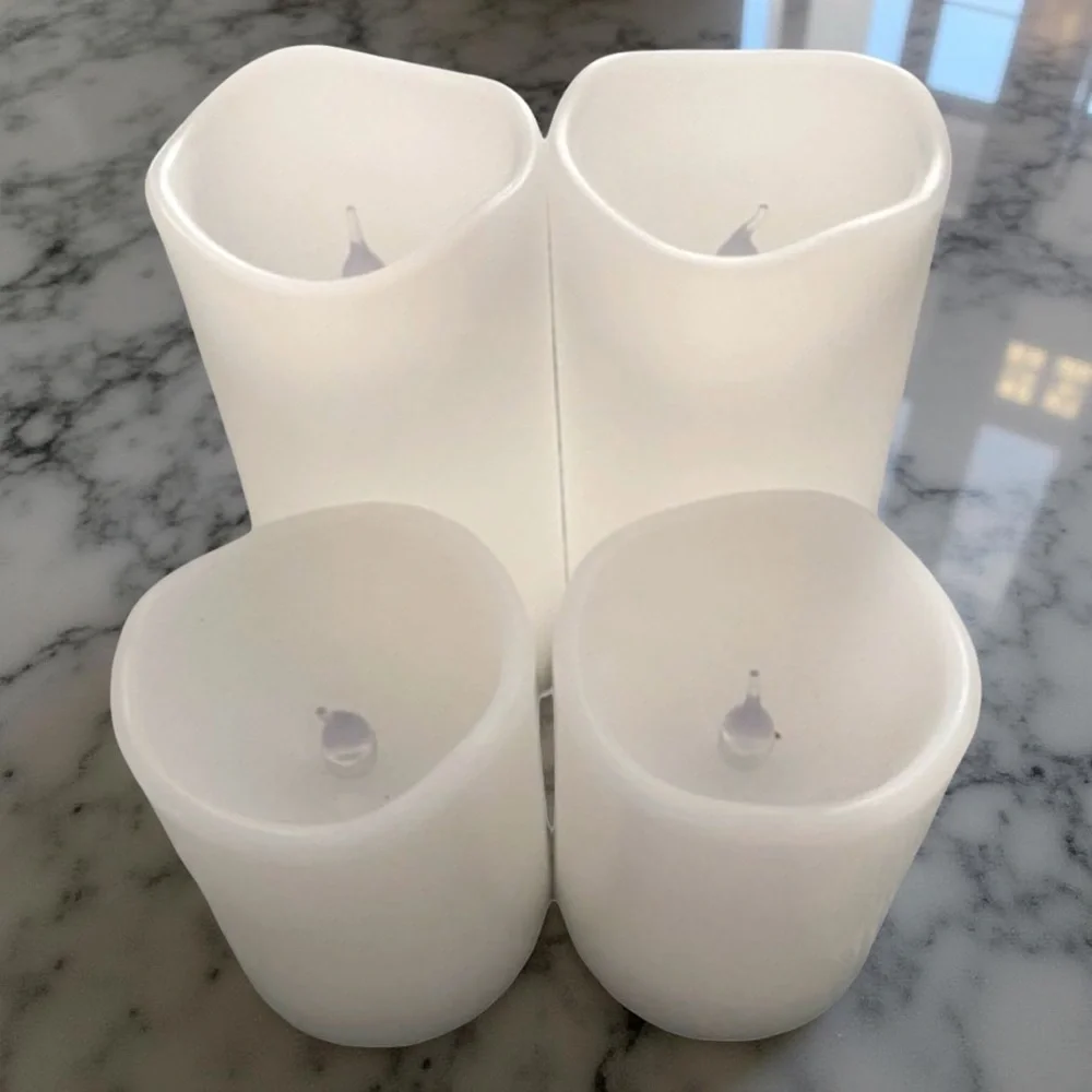 Four White Pillar Candles / Battery Operated
